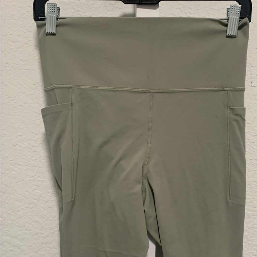 Athleta Salutation Stash Green 7/8 Leggings - Picture 2 of 9